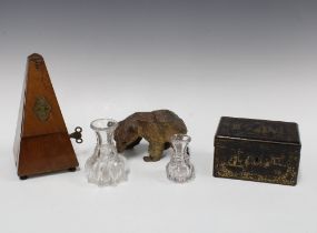 Mixed lot to include a metronome, black forest carved bear,lacquered box and glass measures, (a lot)