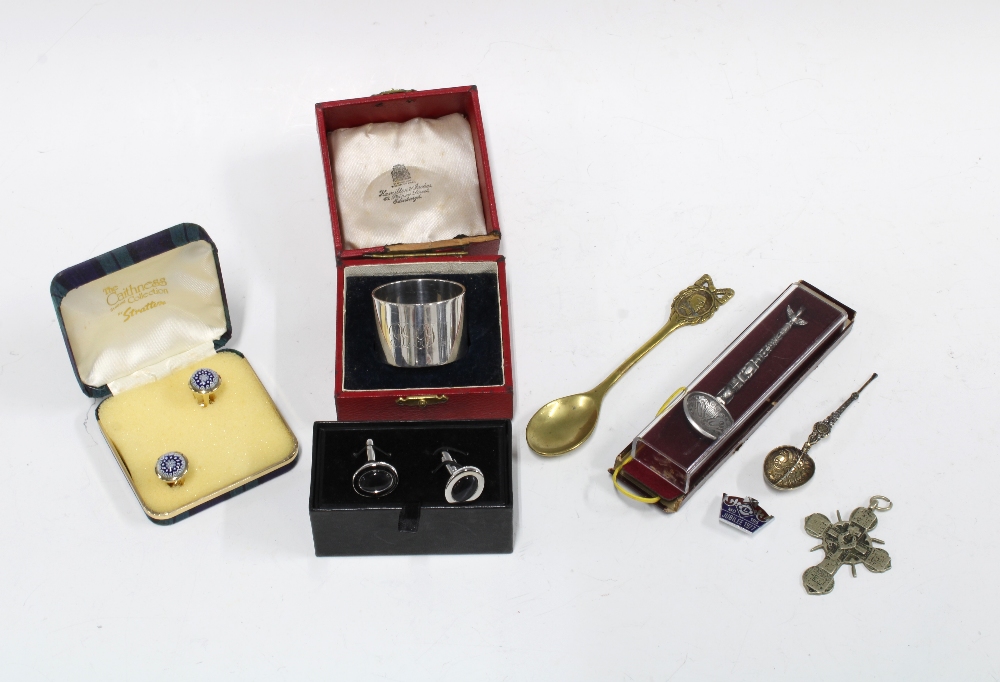 Caithness Glass cufflinks, silver napkin ring, commemorative spoons, pewter cross pendant, etc (a