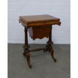 Burr walnut sewing table, hinged lid and fitted interior above pull out work bag, raised on turned