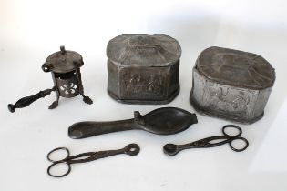 An early iron wax jack with pierced design, two pairs of iron pincers, one pair German the other...