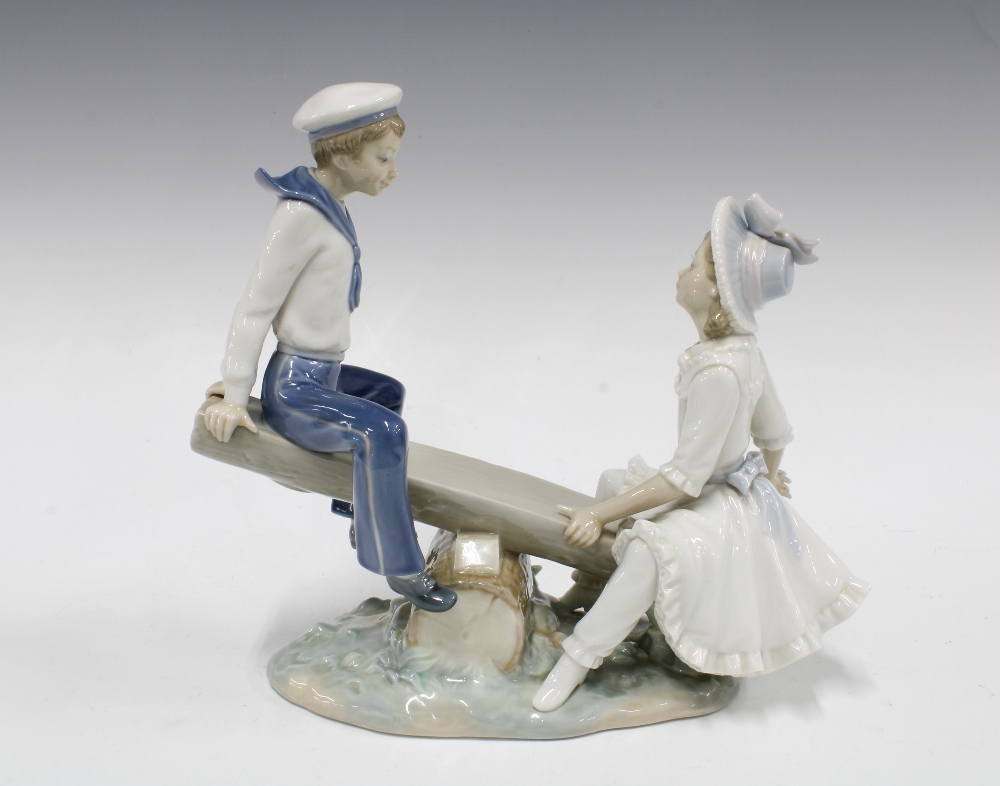Lladro seesaw figure group, 24cm together - Image 2 of 3