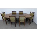 An oak extending dining table and six chairs, 216 x 72 x 107cm. (7)