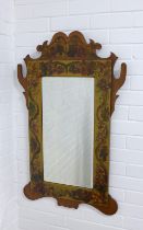 Floral painted wall mirror, 62 x 99cm.
