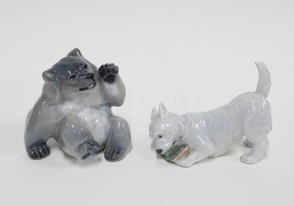 Rare Royal Copenhagen porcelain figure of a walking Bear and a Dog with a Slipper, Model 145, 12cm