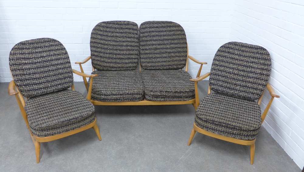 Ercol vintage blonde elm three piece suite, comprising a two seater stick back settee and pair of