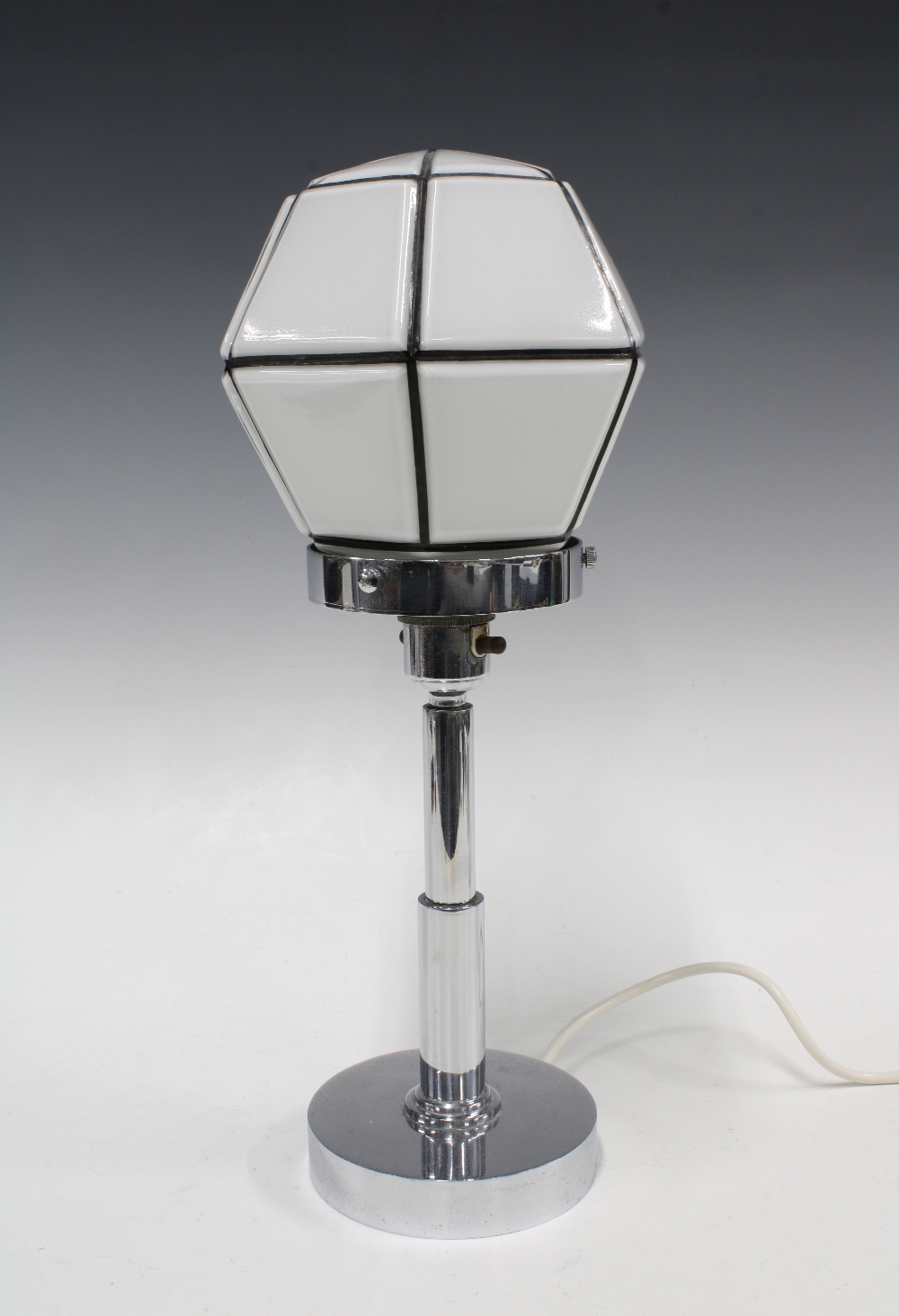Art Deco chrome table lamp with an hexagonal white and black glass shade, 38cm including shade