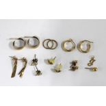Collection of yellow metal earrings