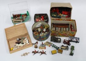 A collection of vintage lead figures together with a Hornby tinplate station shop and accessories