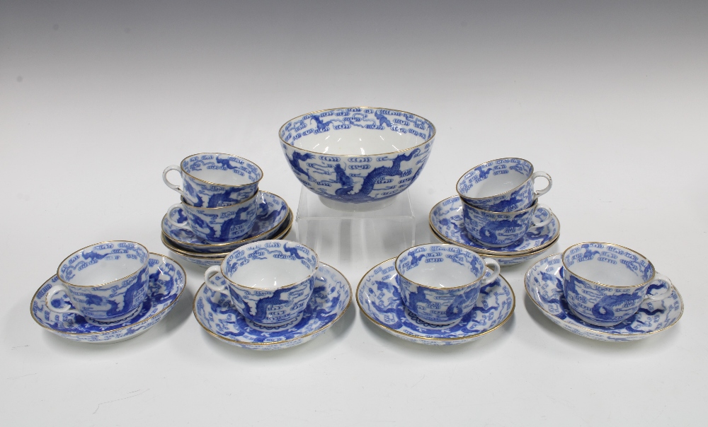Blue and white dragon and pearl of wisdom pattern teaset highlighted with gilt rims, comprising