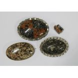 A collection of three victorian granite brooches, largest approx 6.5cm long, and a small granite