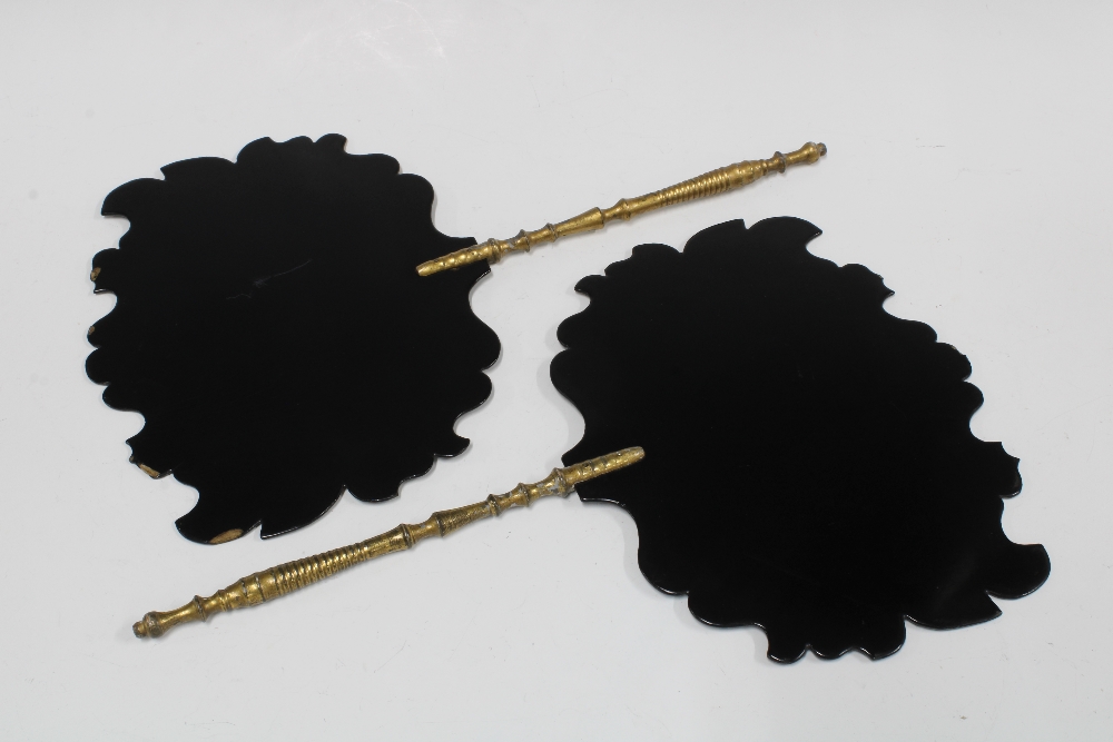 A pair of 19th century black lacquered papier mache face screens, each painted with flowers gilt - Image 2 of 2