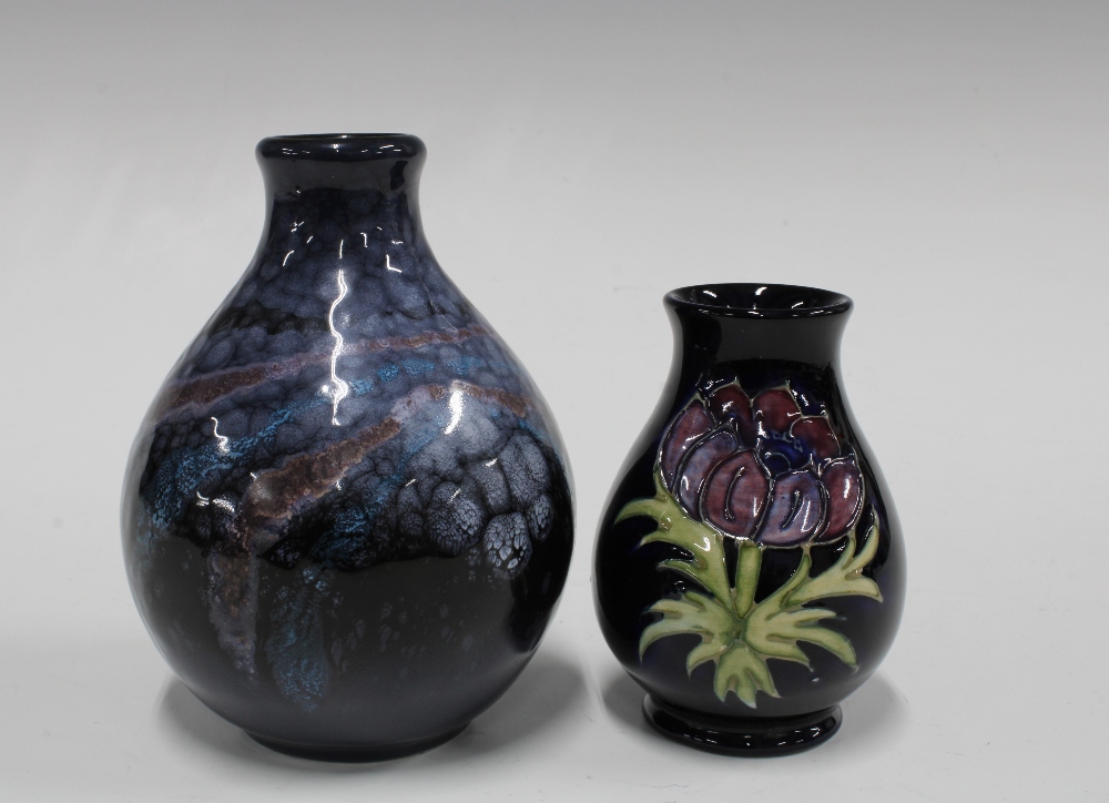 Moorcroft anemone pattern vase, 9cm and a small Poole Pottery vase (2)