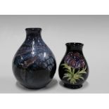 Moorcroft anemone pattern vase, 9cm and a small Poole Pottery vase (2)