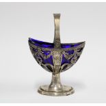 18th / 19th century Continental silver swing handled basket, pierced design with shaped blue glass