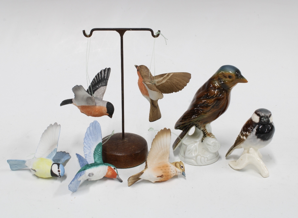 A group of porcelain and bisque bird figures (6)