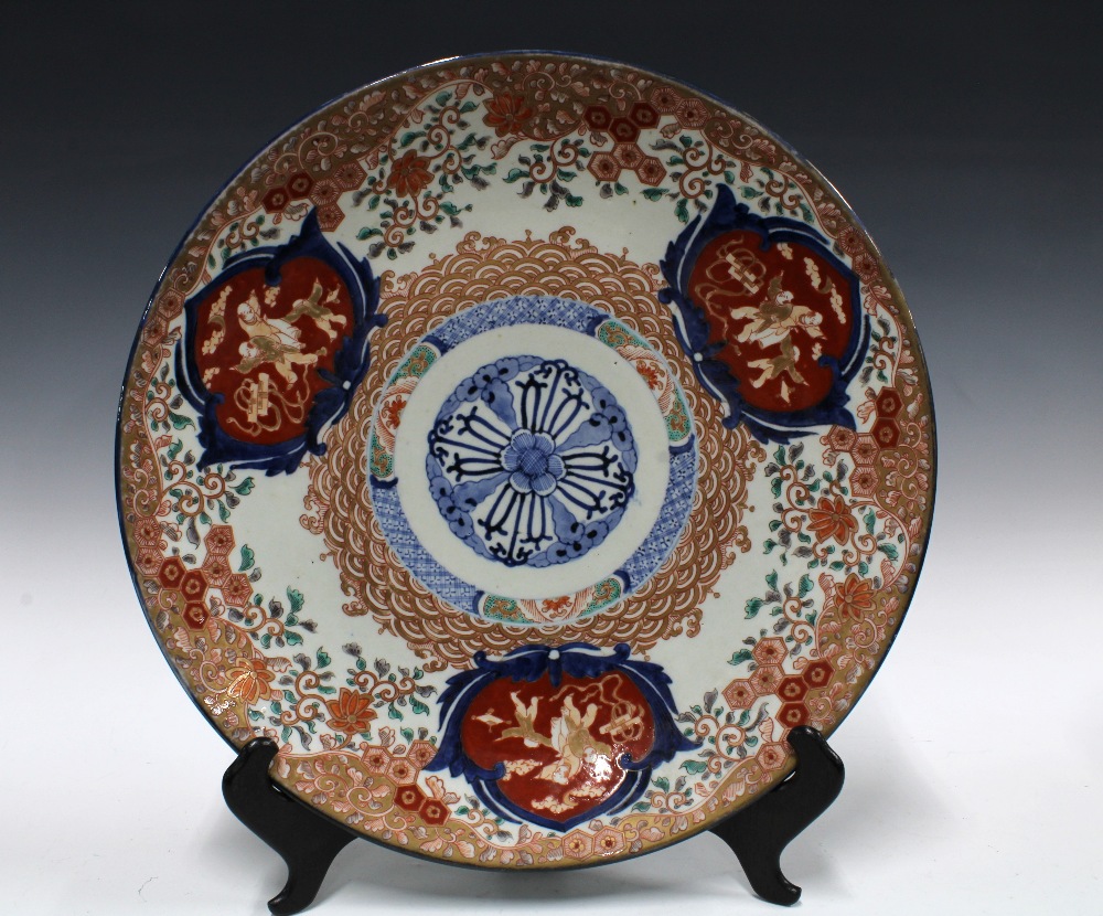 Large Imari charger, typically decorated and with underglaze blue roundel to centre, 46cm diameter
