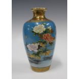 Japanese earthenware baluster vase, turquoise glazed ground and decorated with a pattern of birds,