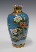 Japanese earthenware baluster vase, turquoise glazed ground and decorated with a pattern of birds,