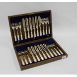 Oak canteen with a set of twelve mother of pearl and Epns fish knives and forks