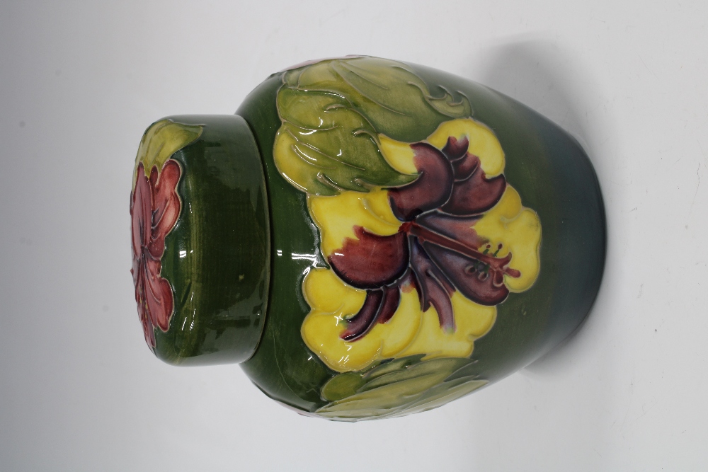 Moorcroft hibiscus pattern vase and cover, green ground, impressed marks, 16cm - Image 2 of 3