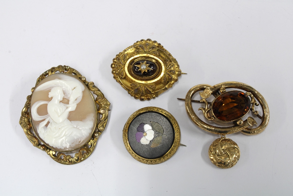 Four late 19th / early 20th century brooches to include pietra dura, cameo and citrine, etc (4)