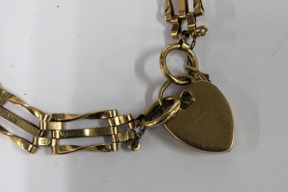 9ct gold gatelink bracelet with a heart shaped padlock, stamped 9ct & 375 and a 9ct gold chain - Image 3 of 3
