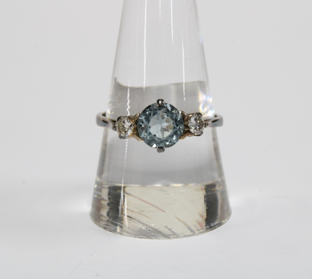 18ct gold three stone diamond and aquamarine ring, stamped 18ct