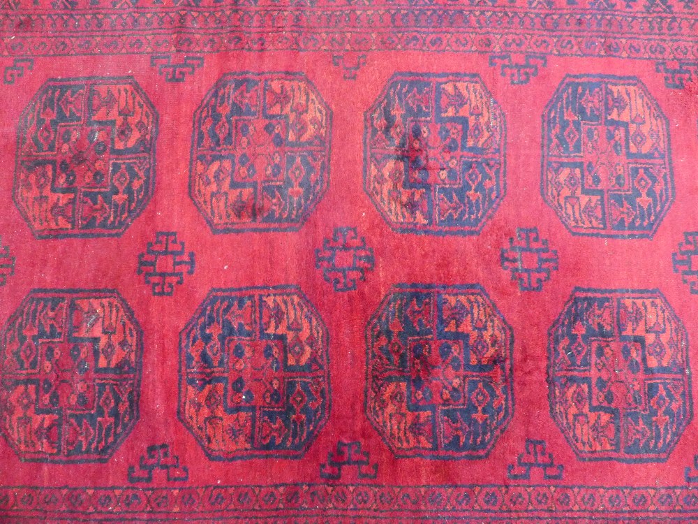 Afghan rug with red field, 300 x 235cm. - Image 2 of 4