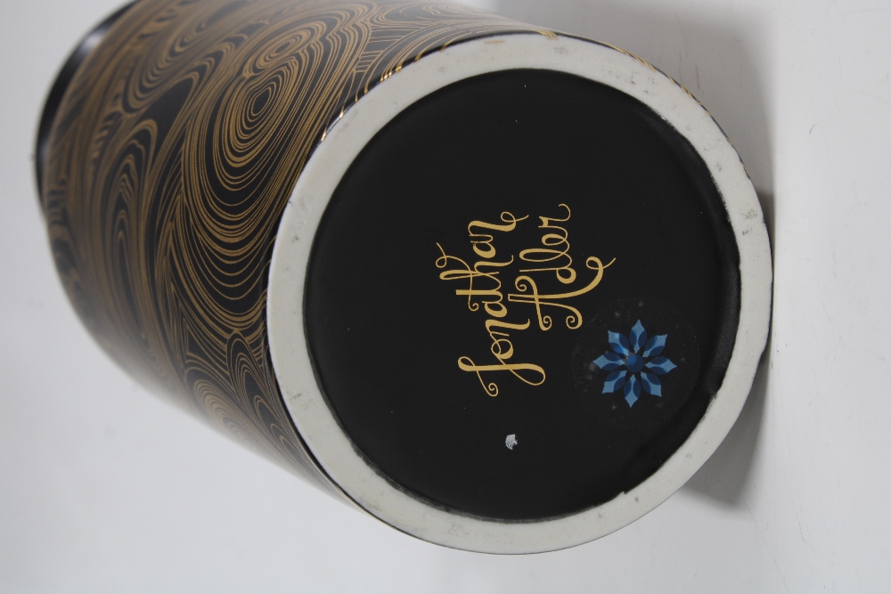 Jonathan Adler vase, black ground with typical gilt swirling pattern, base signed, 23cm - Image 2 of 2