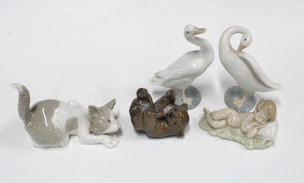 Royal Copenhagen baby bear figure and four LLadro figures (5)