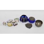 A collection of porcelain snuff and pill trinket boxes together with a white metal dish, blue