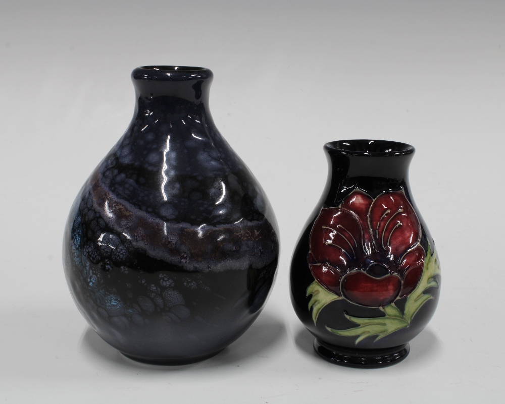 Moorcroft anemone pattern vase, 9cm and a small Poole Pottery vase (2) - Image 2 of 3