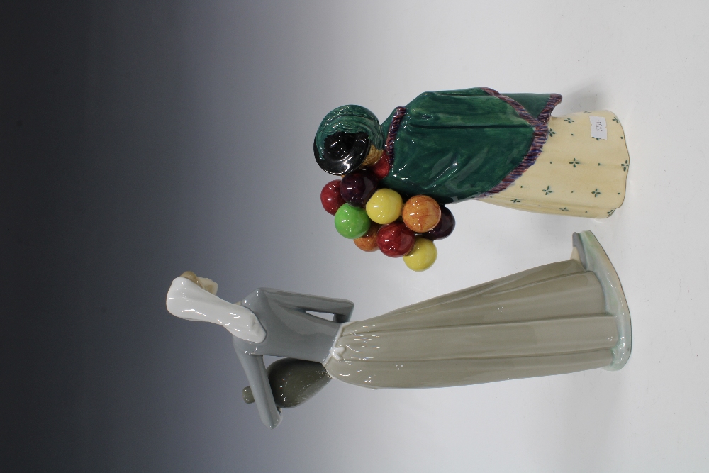 Royal Doulton figure The Balloon Seller HN583, 22cm, together with a Lladro figure (2) - Image 2 of 3