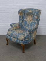 Wingback armchair with country house floral upholstery / covers, 78 x 102 x 52cm.
