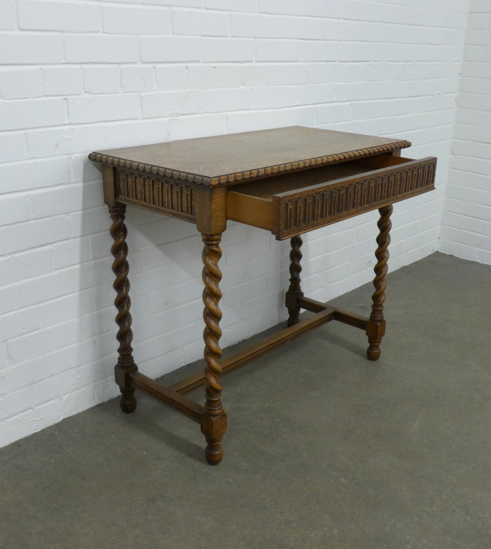 An oak side table with single long drawer, on spiral supports, 88 x 78 x 46cm. - Image 4 of 4