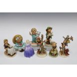 Group of seven Goebel Hummel figures and a small Royal Doulton figure (8)