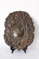 Early copper repousee wall sconce, likely 17th century, engraved verso Thos Spurgeon
