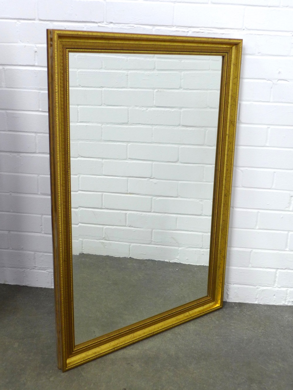 Rectangular gilt framed wall mirror, 97 x 66cm.