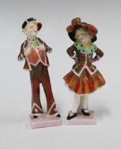 Royal Doulton Pearly Boy and Pearly Girl, (the girl with damage to base) (2) 13cm