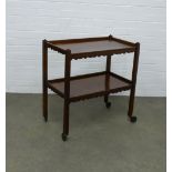 Mahogany two tier trolley table, 69 x 74 x 38cm.