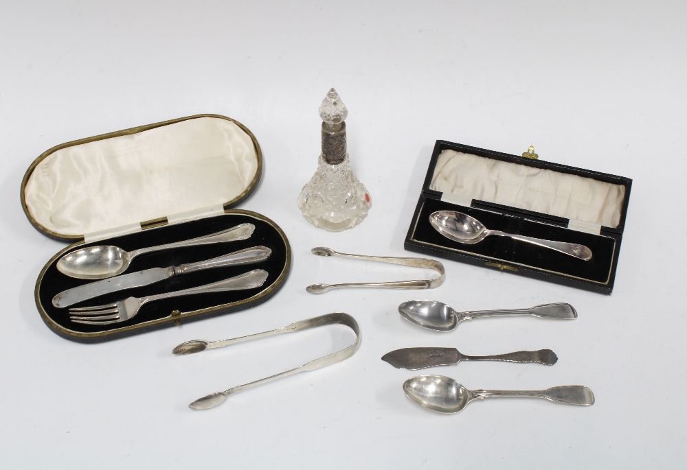 Silver knife, fork and spoon cased set, Sheffield 1927, cut glass scent bottle with silver collar,