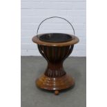 19th century mahogany peat / oyster bucket, hourglass form with metal liner and standing on bun