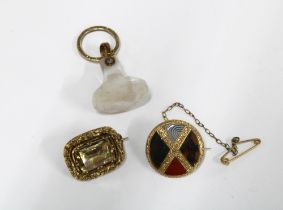 Scottish hardstone brooch and a citrine brooch together with a hardstone intaglio seal, all in