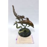Bronze figure of a woman swimming with a dolphin by Jerry Chase Joslin for Joslin Sculpture, 44 x
