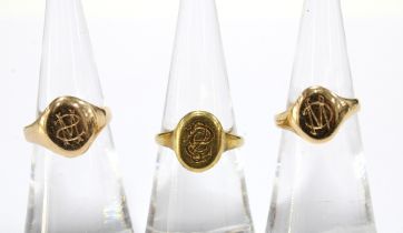 18ct gold signet ring with hallmarks for London 1926 together with two other signet rings with no