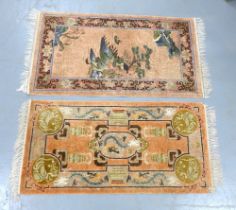 Two small Chinese wool rugs, 126 x 70cm. (2)