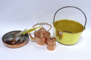 A collection of copper and brass pans, a vintage brass jelly and and a small copper canister and