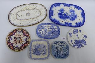 Seven Staffordshire blue and white transfer printed mazarine drainers to include Davenport,