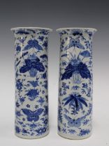 A pair of Chinese blue and white sleeve vases, with birds and butterfly pattern, Kangxi marks but