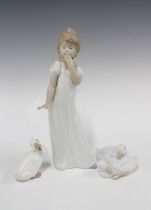 Nao, Spanish porcelain figure of a girl with two Nao ducks (3) 30cm.